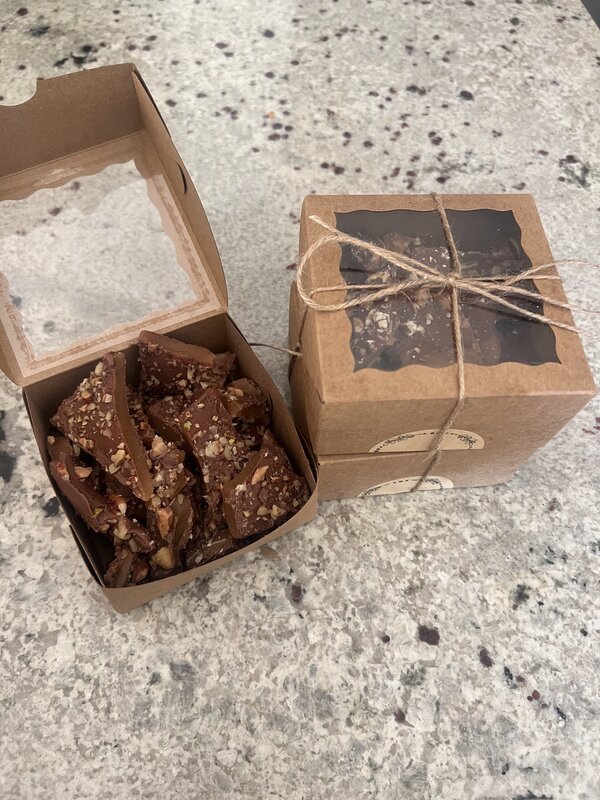 Sunday Toffee - open box showing toffee pieces next to wrapped gift box